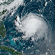 A satellite view of Tropical Storm Henri strengthening in the Atlantic.